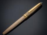 a pen on a black background