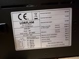 a label on the back of a machine that says lorelam