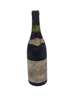 a bottle of wine that is sitting on a table