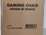 an image of a box of gaming chair sitting on top of a table