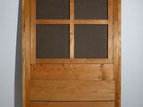 an image of a wooden door with a glass paneled door