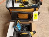 a suitcase with tools in it sitting on the floor