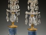 pair of blue and gold - plated candlesticks with crystal drops
