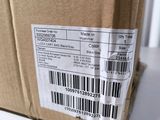 the back of a brown box with a barcode on it