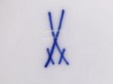 a picture of a plate with a blue and white design on it