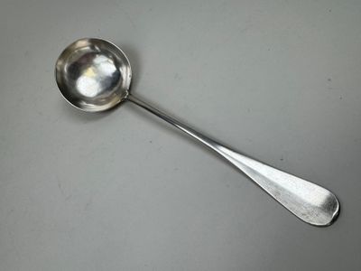 a spoon that is sitting on a table