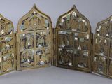 an image of a group of three gold and blue glass panels