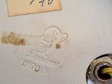 a close up of a white plate with a label on it