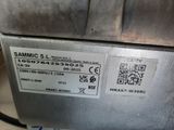 an image of a close up of a metal object with a qr code on it