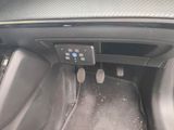 a close up of a car ' s interior with a control panel
