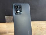a close up of the back of a black iphone 11