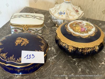 three boxes sitting on a table with a price tag on them