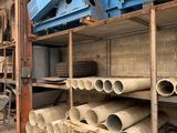 many rolls of paper on the shelves in the warehouse