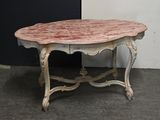 a table that has a marble top on it