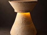a light that is sitting on a small table