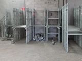 a room filled with lots of metal shelves and chairs