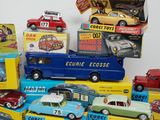 a lot of toy cars that are sitting on top of each other