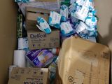 a box full of toilet paper and other items in it