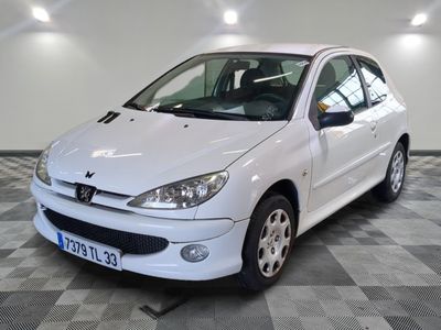 a picture of a white car parked in a garage