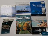 many books that are on the table together