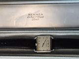 a box with a watch inside of it on a table