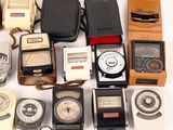 many different types of electronic devices on a white surface