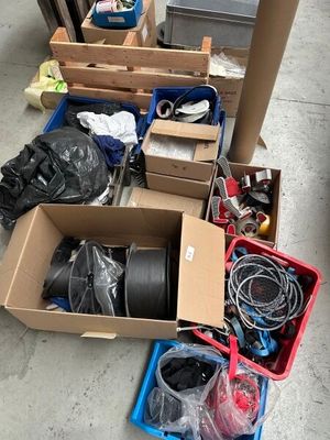 many boxes of assorted items sitting on the floor