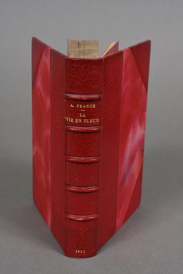 the red book is open to show the inside of it