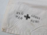 a white bag with a cross on it that says red cross was fun