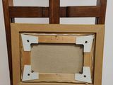 a picture of an old wooden easel with a picture frame on it