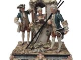 une figurine représentant un homme et une femme debout devant une calèche
