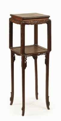 a small wooden table with a shelf on top of it