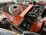 a small machine that is sitting on the ground