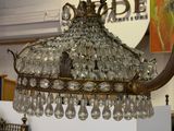 a chandelier hanging from the ceiling in a store