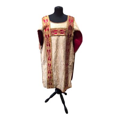 a dress on a mannequin stand with a white background
