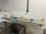 a picture of a kitchen with a sink and a counter top