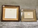 two framed pictures of a man and a woman sitting next to each other