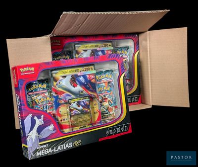 the box is open to show the contents of a pokemon card game