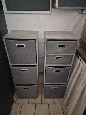 two drawers that are next to each other on the floor