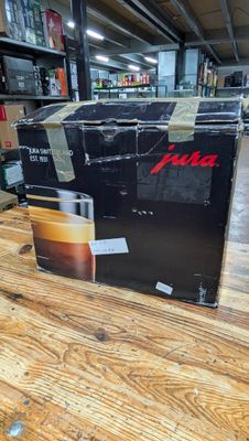 a box of coffee sitting on a table in a store