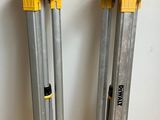 two tripods sitting next to each other on the floor