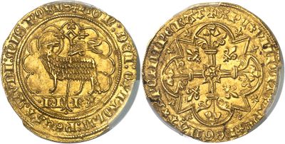 a gold coin with an image of a goat on it