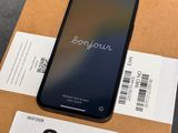 an iphone is sitting on top of a box on a table