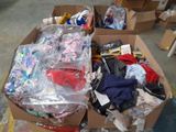 a cardboard box filled with clothing and other items