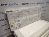 a mattress that is sitting on the floor in front of a wall