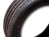 a close up of a tire on a white surface with a white background