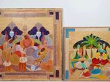 painting of a couple of paintings on a wall next to each other