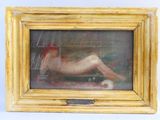 un tableau représentant une femme nue allongée sur un lit