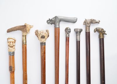 Lot de 8 cannes dont canne à système : au clown, aux chiens,…