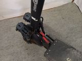 a pair of skis sitting on the ground next to a snowboard